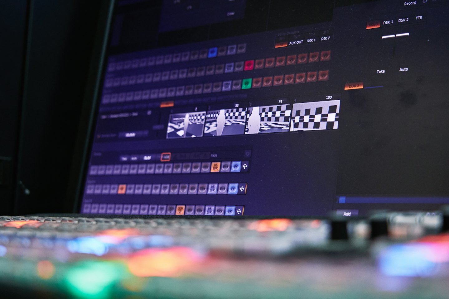 Computer screen shows video editing software with colorful controls and previews.